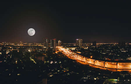 Full moon in the sky in the beautiful city at night.のeditorial素材