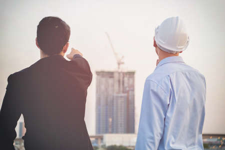 Architects and business associates consulted on the same mission-oriented work plan.の写真素材