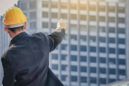 Architects, engineers and consultants in meeting their assigned tasks.Pointing his hand to the goal of success.の写真素材