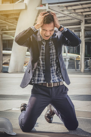 Architects man failed to feeling hopeless, distraught, sad and discouraged in life. Concept failing...