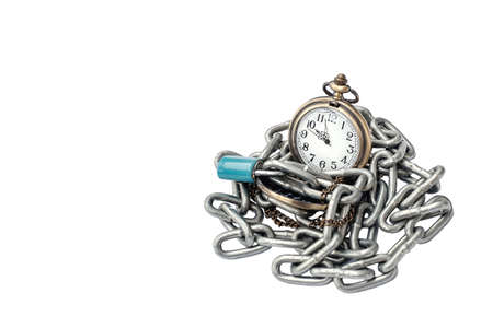 A pocket watch with chain and key lock On a white background isolated  Concept about timeの写真素材