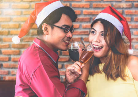 Asian young people enjoy Christmas parties on their holidays.の写真素材