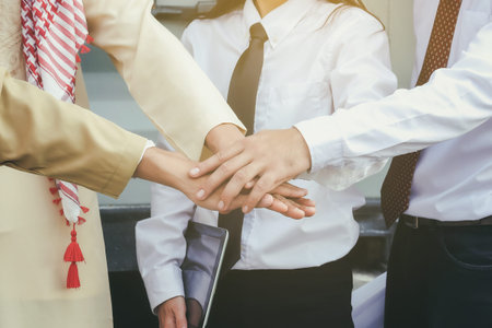 The Business Confederate hands together. The teamwork and unity is the only one completion.