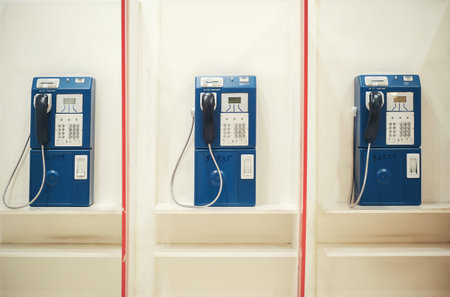 Coin operated public telephones seen in cities that are not very interested in people