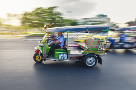 BangkokTHAILAND-September 26:Taxi Tuk Tuk , the public is driving to pick up passengers in a hurry...