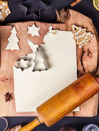 Making of Christmas shaped gingerbread cookies, top viewの写真素材