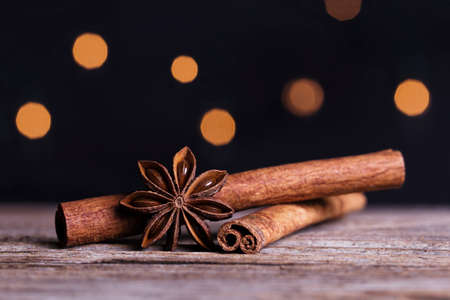 Cinnamon and anise on a wooden tableの写真素材
