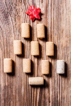 Christmas tree made of wine corks on a rustic backgroundの写真素材
