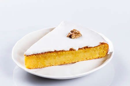 A piece of pumpkin tart on a white plateの写真素材