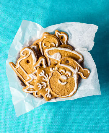 Christmas cookies on a blue piece of clothの写真素材