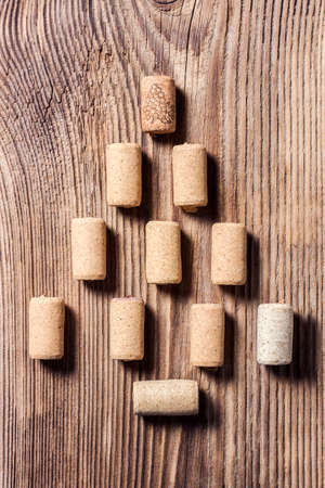 Wine corks forming christmas tree on a wooden backgroundの写真素材