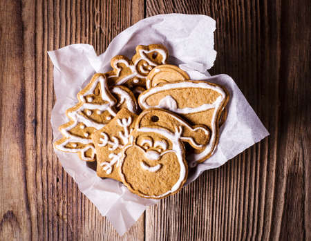 Gingerbread cookies on a wooden tableの写真素材