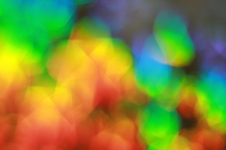 Beautiful background. Bokeh lights are the color of a rainbow in the shape of stars, unfocused. blurred bokeh lightsの写真素材