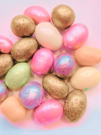 beautiful multicolored nut candy in chocolate colored glaze. aesthetic photos, fashionable colors. photo background close-upの写真素材