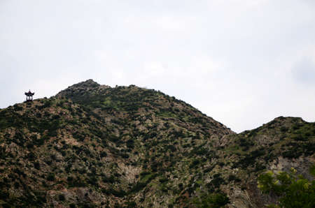 Fun in the mountains, cute goats, beautiful mountains, blue sky, and creeksの写真素材