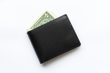 Black leather Men's Wallet with dollar cash on white backgroundの写真素材