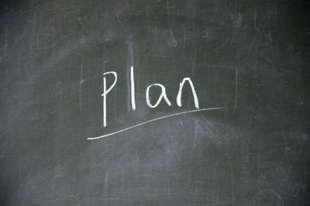 plan title written with chalk on blackboard