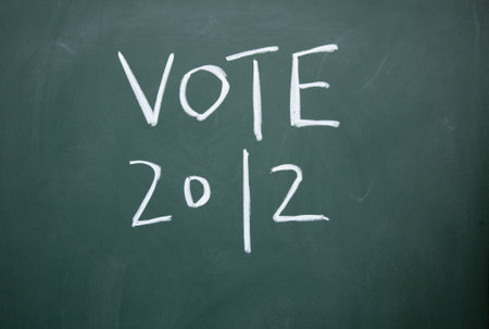 vote title written with chalk on blackboard