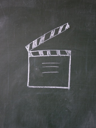 film sign drawn with chalk on blackboardの写真素材