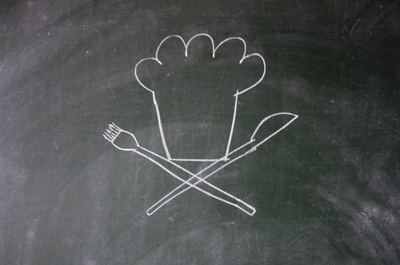 chef sign drawn with chalk on blackboardの写真素材