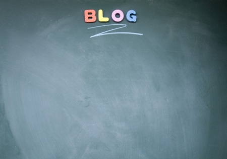 blog title written with chalk on blackboardの写真素材