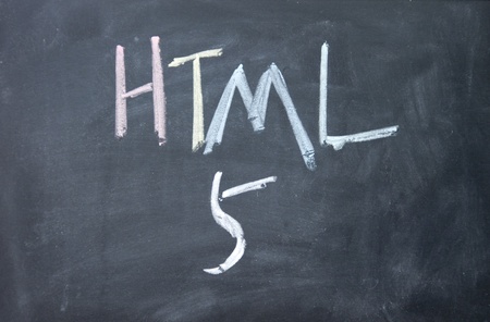 html 5 sign written with chalk on blackboardの写真素材