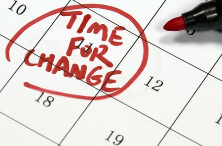time for change sign written with pen on calendarの写真素材