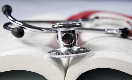 stethoscope and bookの写真素材