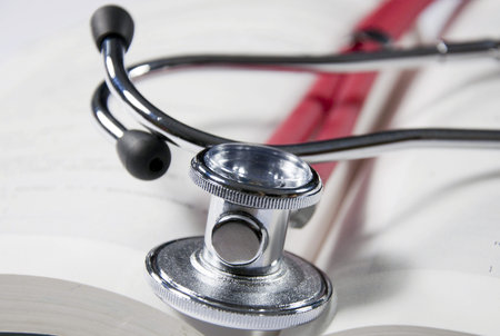 stethoscope and bookの写真素材