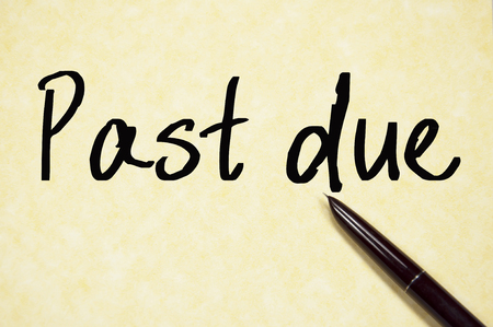 past due text write on paperの写真素材
