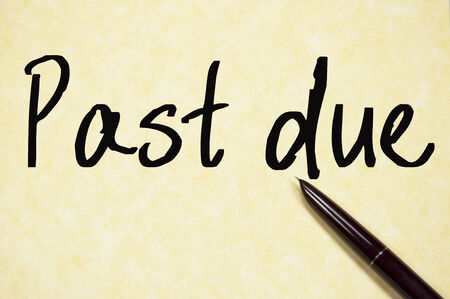 past due text write on paperの写真素材