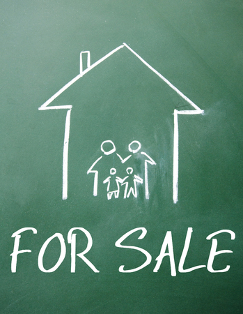 for sale sign on blackboardの写真素材