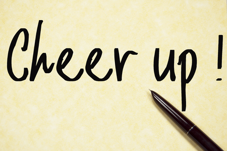 cheer up text write on paperの写真素材
