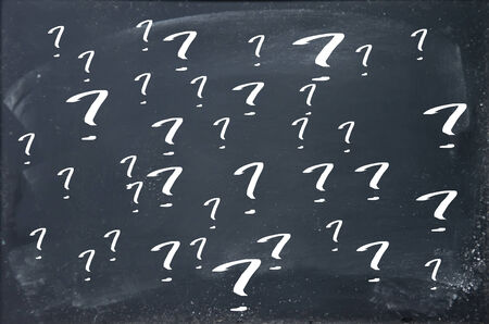 question mark on blackboardの写真素材