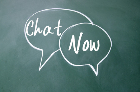 chat now sign on blackboardの写真素材