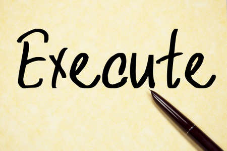 execute word write on paperの写真素材