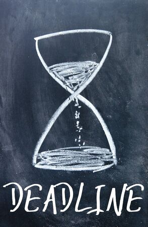 deadline sign on blackboardの写真素材