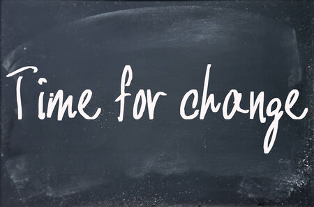 time for change text write on blackboardの写真素材