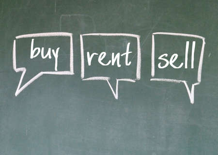 buy, rent, sell think sign on blackboardの写真素材