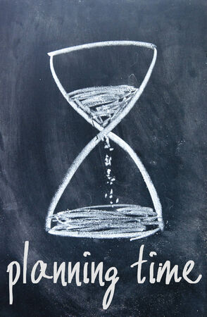 planning time sign on blackboardの写真素材