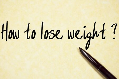 how to lose weight text write on paperの写真素材