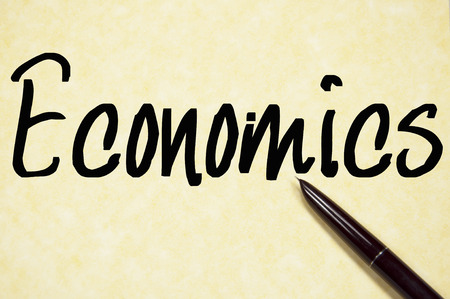 Economics word write on paperの写真素材