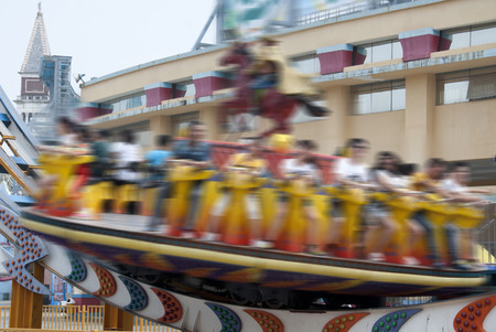 soaring across the skies in amusement parkのeditorial素材