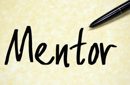 mentor word write on paperの写真素材