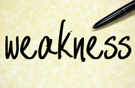 weakness word write on paperの写真素材