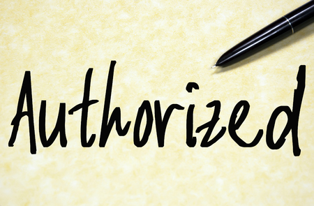 authorized word write on paperの写真素材