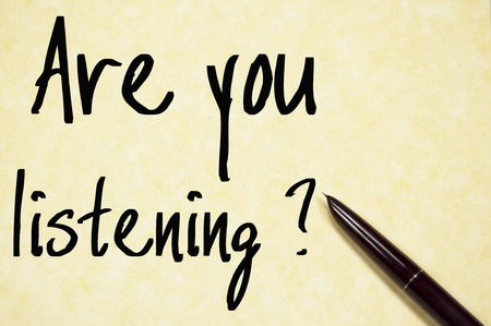 are you listening question write on paperの写真素材
