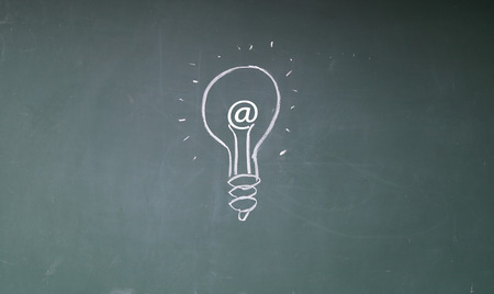 internet bulb sign on blackboardの写真素材