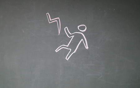 caution lighting on blackboardの写真素材