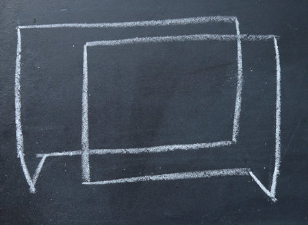 consensus talk sign on blackboard